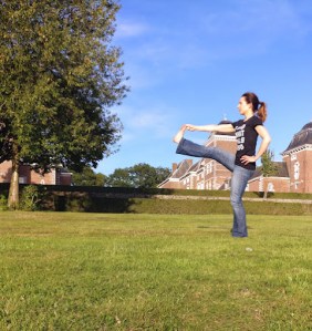Yoga Instructor practicing Yoga outdoors.